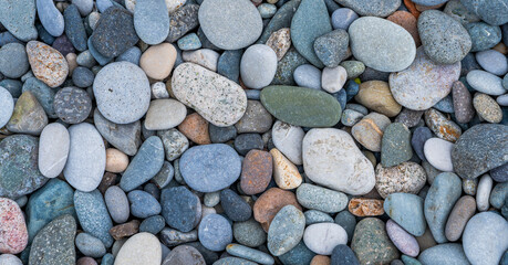 Small sea stones, gravel. Background. Textures