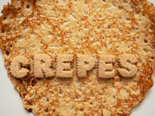 Sign crepes on top of the product. Popular simple multi national food known for its taste and flavoring options.