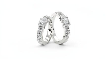 Naklejka premium Pair of white gold wedding rings with diamonds