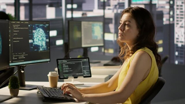 Admin developing artificial intelligence machine learning APIs solving complex problems. Woman training AI predictive models capable of handling resource intensive tasks, camera A