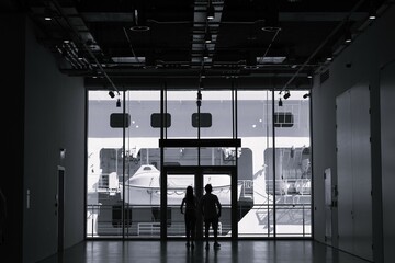 people in the museum looking at a cruise