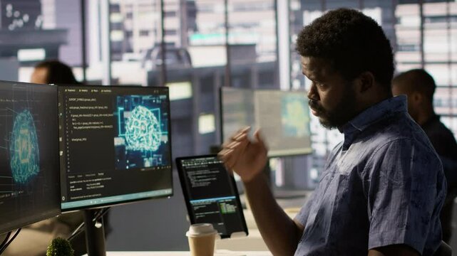 Manager coming to check on progress done by programmer creating AI machine learning models that can analyze data. Team leader supervising man doing artificial intelligence programming, camera A
