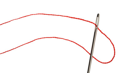 Sewing needle with red thread isolated on white