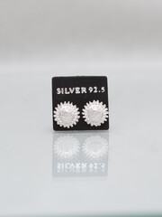 Hmong or Miao handmade silver jewelry on white background