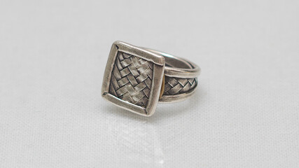 Hmong or Miao handmade silver jewelry on white background