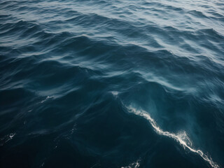 Fototapeta premium Blue-green waves ebb and flow with calming gracefulness.