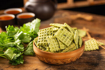 a kind of delicious snack made from rice,Cilantro flavored rice crusts, 