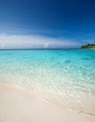 Fototapeta premium Crystal clear water meets a pristine beach.