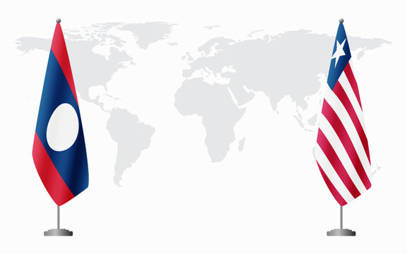 Laos and Liberia flags for official meeting against background of world map.