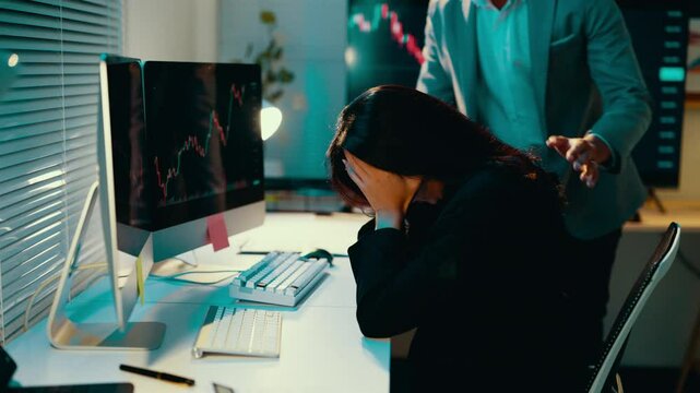 Businesswoman feeling distressed while viewing the latest stock market results on a computer screen, receiving bad news from her partner and grappling with emotions of anxiety and disappointment