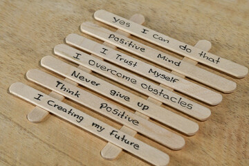 close up of a hand written message on a popsicle stick as a self esteem building concept, Motivational concept with handwritten text. positive affirmations word, Climbing The Ladder Of Success Concept