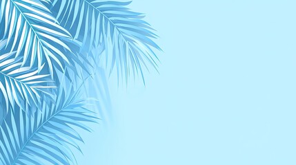 Obraz premium Blue palm leaves on a blue background with copy space.