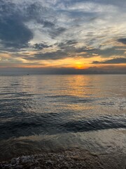 Fototapeta premium Sunset over the sea in Thailand