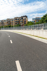 Empty urban road and buildings in the city