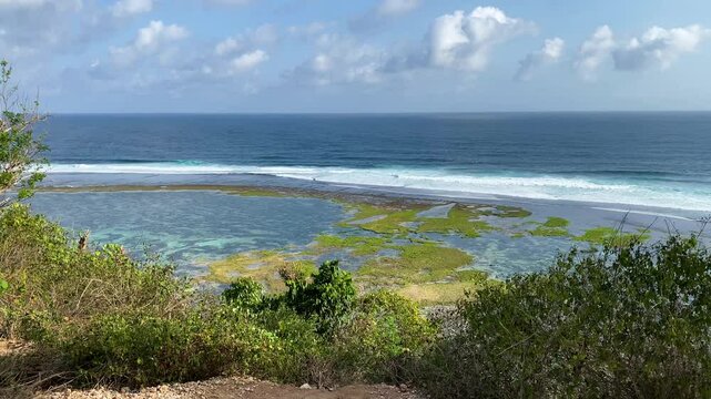 Aerial panoramic view of Batu Barak beach, also known as Tanah Barak beach, in Bali, Indonesia.