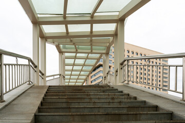 Flight of Stairs to a Modern Pedestrian Bridge