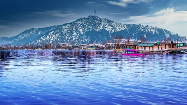 Pink Boat In The Dal Lake Kashmir India, Boats Are Resting In Dal Lake With Reflection Of Clouds And Mountains In Kashmir.