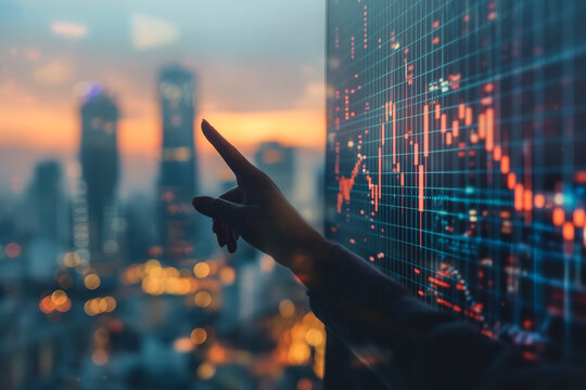 A hand pointing at a digital stock market graph with cityscape background. This image portrays financial analysis, technology, and investment opportunities in a dynamic urban setting - Powered by Adobe