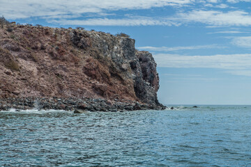 Fototapeta premium Navigating the rocky mountain formations on CORONADO Island in Loreto Baja California Sur. Natural landscapes, seascapes and geology of MEXICO.