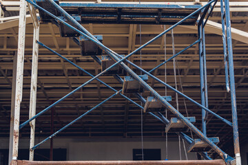 A construction site displaying a reinforced concrete foundation with steel rebar