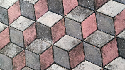 Obraz premium Black and red three dimensional paving blocks