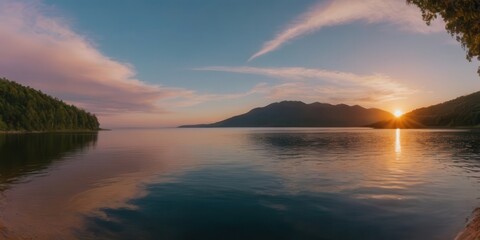 Fototapeta premium A breathtaking panoramic view of a vibrant sunset over a tranquil body of water