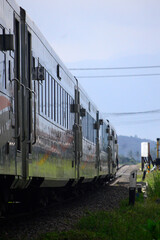 Naklejka premium The train passes through the countryside with beautiful natural views.