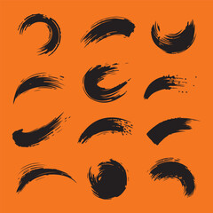 Set of Ink brush stroke silhouettes in various shapes and sizes