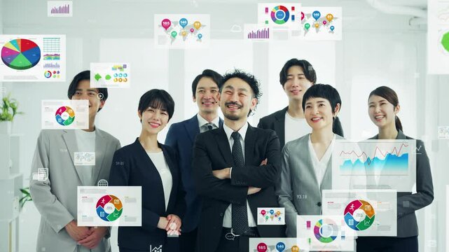オフィスに集まるビジネスパーソンのグループとビジネスデータ