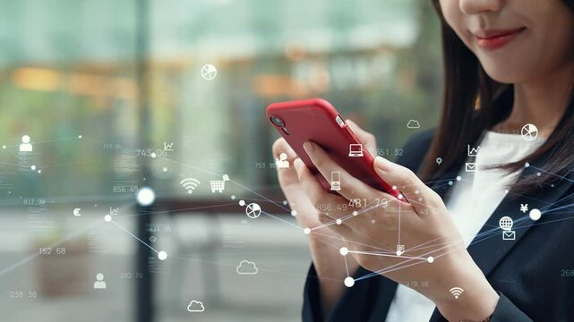 Woman using smartphone in the city and digital network concept