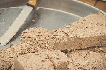 Halva with cocoa on stall at bazaar. High calorie snack