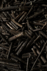 Close of pile of wood preparing for firewood in vertical