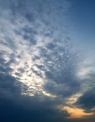 Sunset sky with clouds. Nature background. Sky with clouds and sun