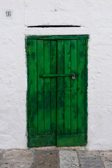 Old authentic vintage closed front door in Ostuni, Puglia, Italy