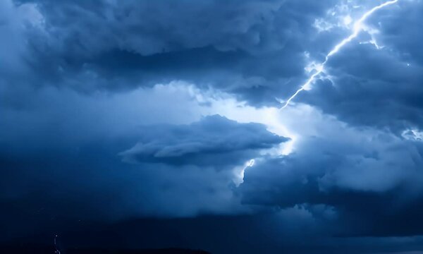 blue thunderclouds with constant lightning.
