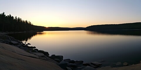 Panorama of beautiful sunrise over lake  