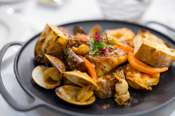 Grill with sauce seafood in the restaurant