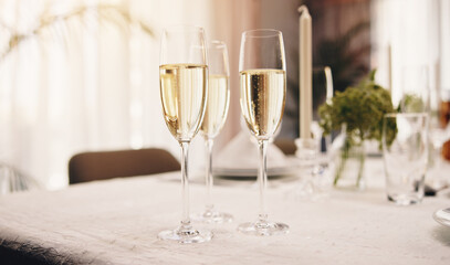 Alcohol, champagne and glass on table at party for celebration, social event and gathering. Fine...
