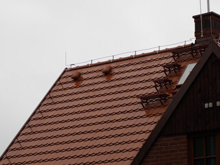 Modern Snow Melting System on Tiled House Roof