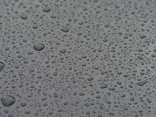 Water Droplets on Smooth Light-Toned Surface