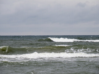 Calming Seascape with Waves Under a Cloudy Sky