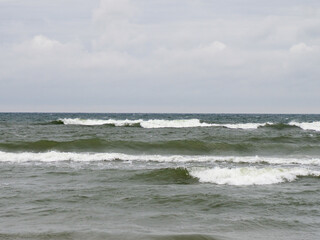 Endless Ocean Under a Cloudy Sky: Serenity and Grandeur of Nature