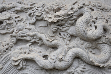 Chinese traditional cultural element architecture - stone carving nine Dragon Wall.