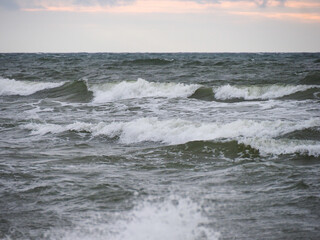 Turbulent Ocean Waves Under a Brooding Sky at Dawn