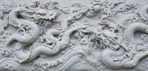Chinese traditional cultural element architecture - stone carving nine Dragon Wall.