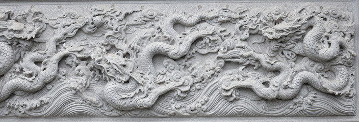 Chinese traditional cultural element architecture - stone carving nine Dragon Wall.