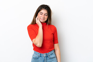 Young caucasian woman isolated on white background with toothache