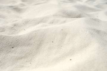 White clear sand dunes, fine sand fraction close-up on sea ocean river beach. Nature park outdoors for rest, relax, travelling.
