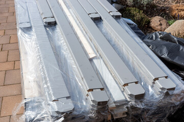 New grey wooden boards for the gazebo on pallet