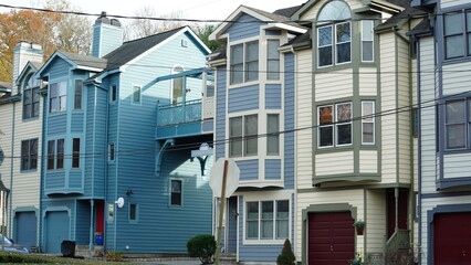 The beautiful little town landscape with the colorful autumn leaves and old buildings in USA
